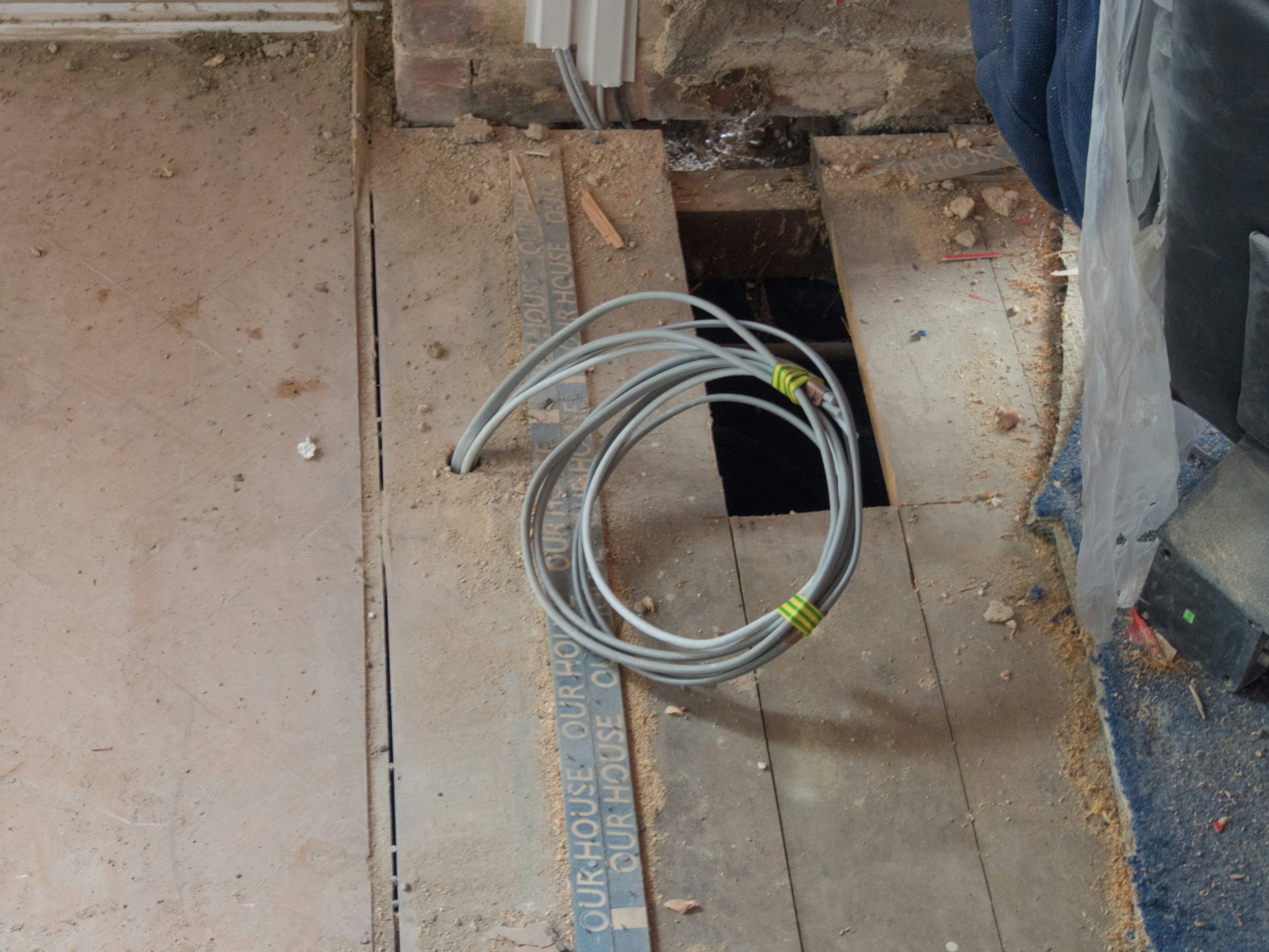 white coated wire on floor